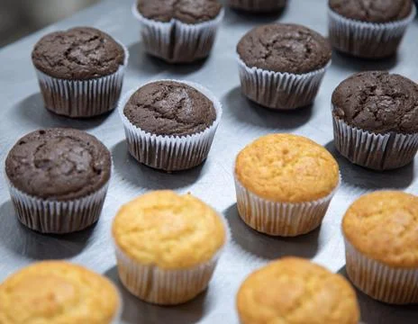 Cupcake production inside the bakery Stock Photos