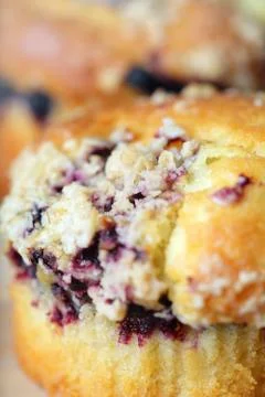 Cupcake with raspberry Stock Photos