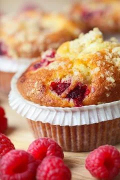 Cupcake with raspberry Stock Photos