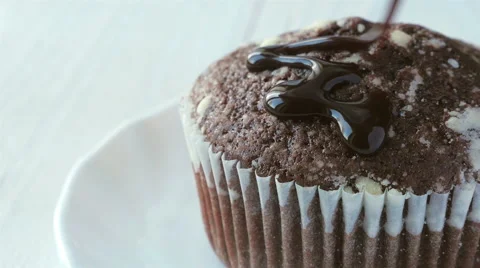 Cupcake sprinkled with chocolate Stock Footage 58438759