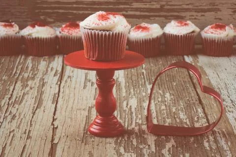 Cupcake on stand with rustic background Stock Photos