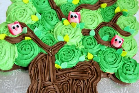 Cupcake tree icing with owlets Stock Photos
