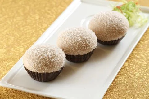 Cupcake on white plate Stock Photos