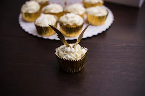 Cupcakes with an angle wings on a table Stock Photos
