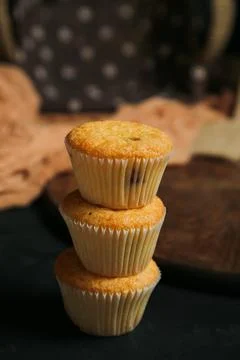 Cupcakes on a black background. Baking Stockfoto's