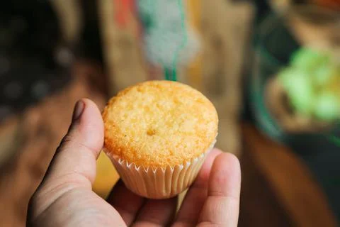 Cupcakes on a black background. Baking Stock Photos