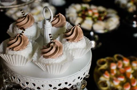 Cupcakes on a buffet table Stock Photos