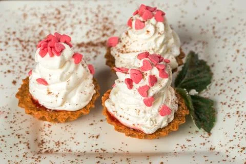 Cupcakes with cream Stock Photos