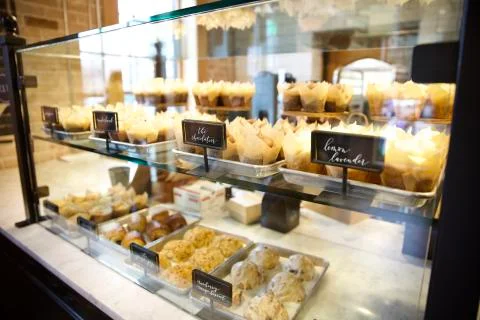 Cupcakes in a display case Stock Photos