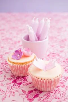 Cupcakes with flowers Stock Photos