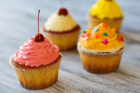 Cupcakes on gray surface. Stock Photos