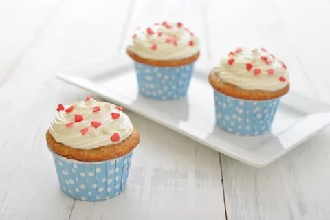 Cupcakes with icing Stock Photos
