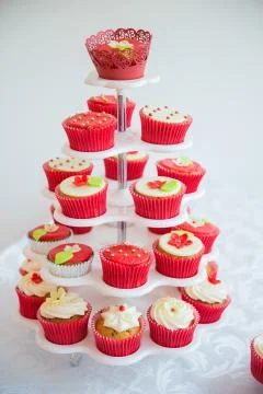 Cupcakes on the plates on the table Photos