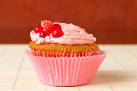 Cupcakes with red currant Stock Photos