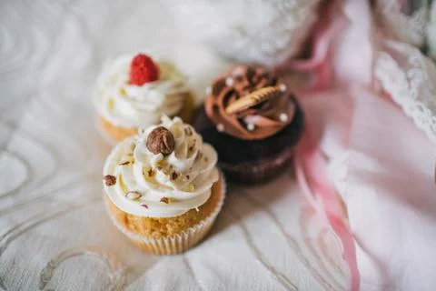 Cupcakes on the sofa closeup Stock Photos