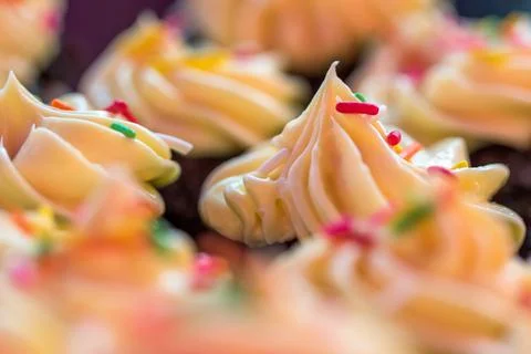 Cupcakes topping close-up Stock Photos