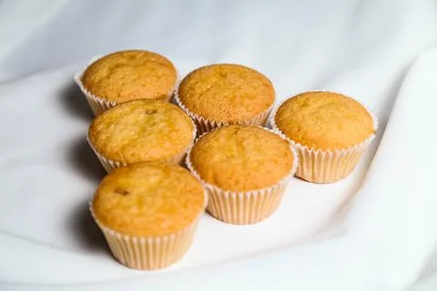 Cupcakes on a white background. Baking Stock Photos