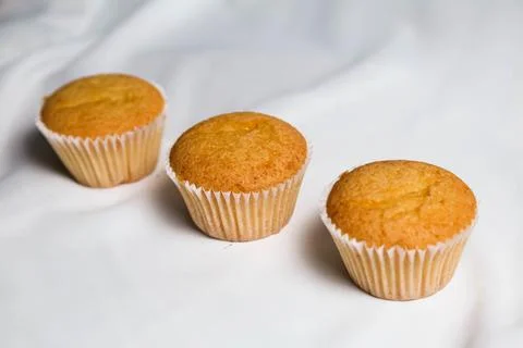 Cupcakes on a white background. Baking Stock Photos