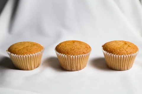 Cupcakes on a white background. Baking Stock Photos