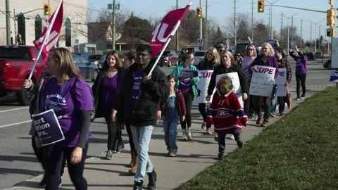CUPE strike large group with kids, Ottawa Ontario Canada. November 4th 2022. Video stock 222139842