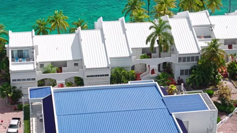 Cupecoy, Sint Maarten Island, Drone Shot of Modern Seafront Villas and Resort Video stock 339696186