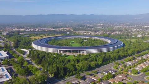 Cupertino California Aerial Pullback View of Homes and Circular Tech Campus 01 Stockbeeldmateriaal 335322297