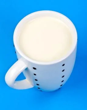 Cupful of milk Stock Photos