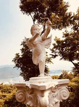 Cupid with an arrow Stock Photos