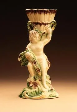 Cupid with Cornucopia Cup. Attributed to Ralph Wood (England, Staffordshire.. Stock Photos