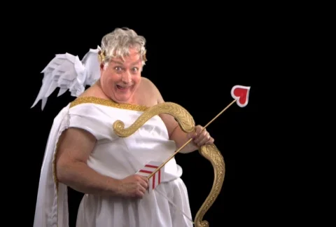 Cupid pointing bow and arrow Stock Footage 754286