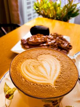 Cups of coffee decorated with a heart Stock Photos