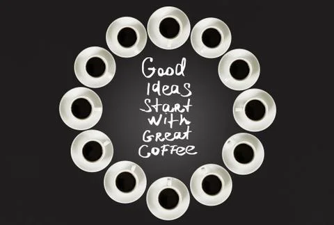 Cups with coffee, stacked in a circle. Clock consist of twenty cups. Black Stock Photos