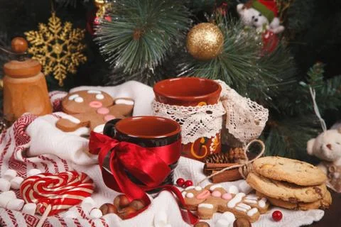 Cups on holiday decorations Stock Photos