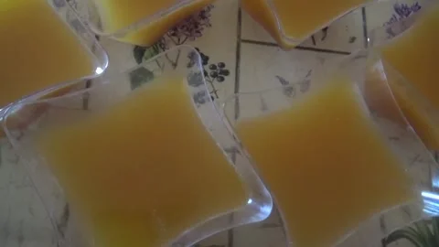 Cups with jelly on a tray Stock Footage 309366969