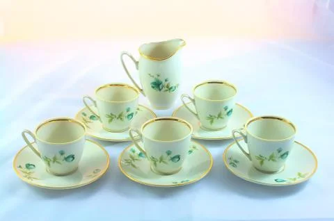 Cups with pitcher Stock Photos