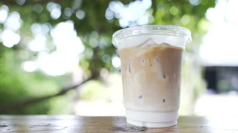Cups of plastic ice milk coffee drinks or latte Stock Footage 134932117