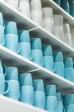 Cups on the shelves Stock Photos