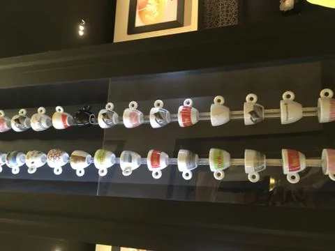 Cups in a showcase Stock Photos