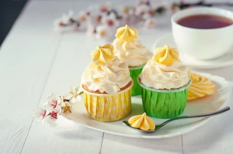 Cups for tea, dessert, everything is ready for the arrival of guests. Stock Photos