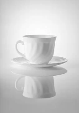 Cups for tea on a white background Стоковые фото