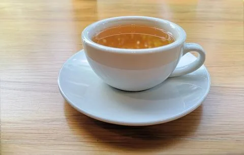 A cups of tea on wood table Stock Photos