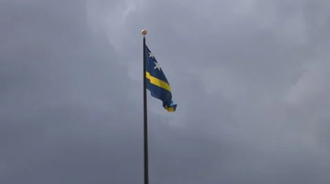Curaçao flag waves in cloudy sky with background noise Stock Footage 41376739