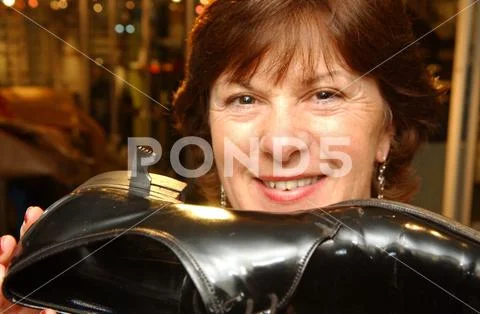 Curator Marilyn Bullivant Shows A Shoe With Extended Escape Blade ...