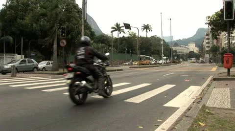 Curb Side View of Heavy Traffic Moving Down A Busy City Street Video stock 19705485
