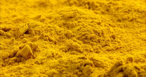 Curcuma turmeric ground full frame flat background Stock Footage 94024929