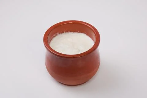 Curd in clay pot Stock Photos