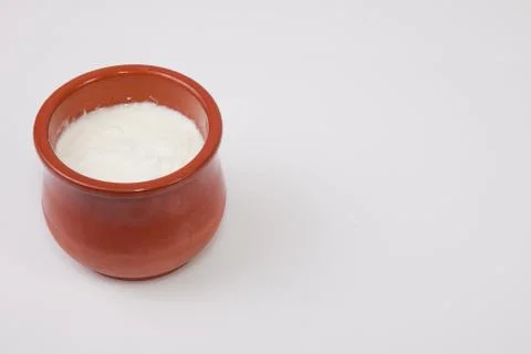 Curd in clay pot Stock Photos