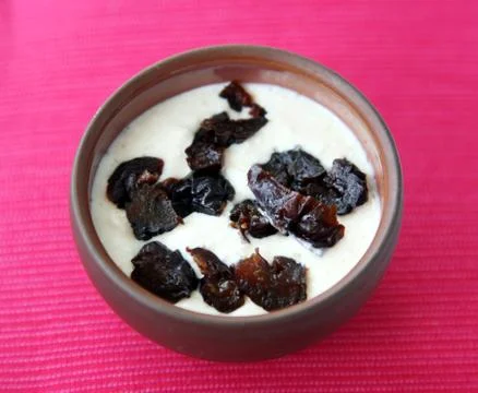 Curd with prunes Stock Photos