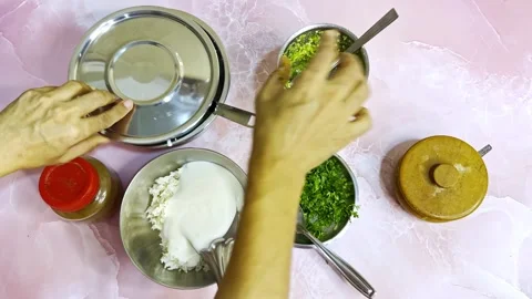 Curd Rice Being Mixed by Hand in Indian Kitchen Stock Footage 305960856