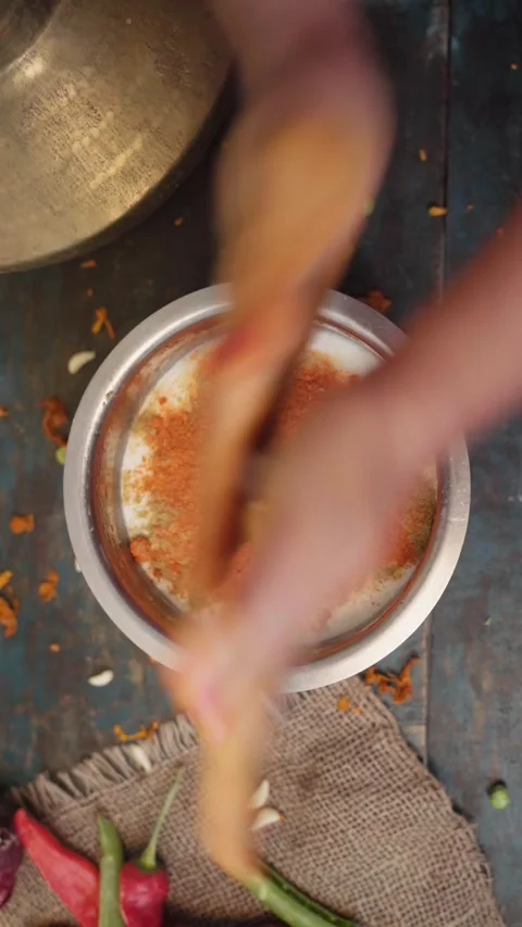Curdcurd churned through bilona for making raita or yogurt. Stock Footage 283362197